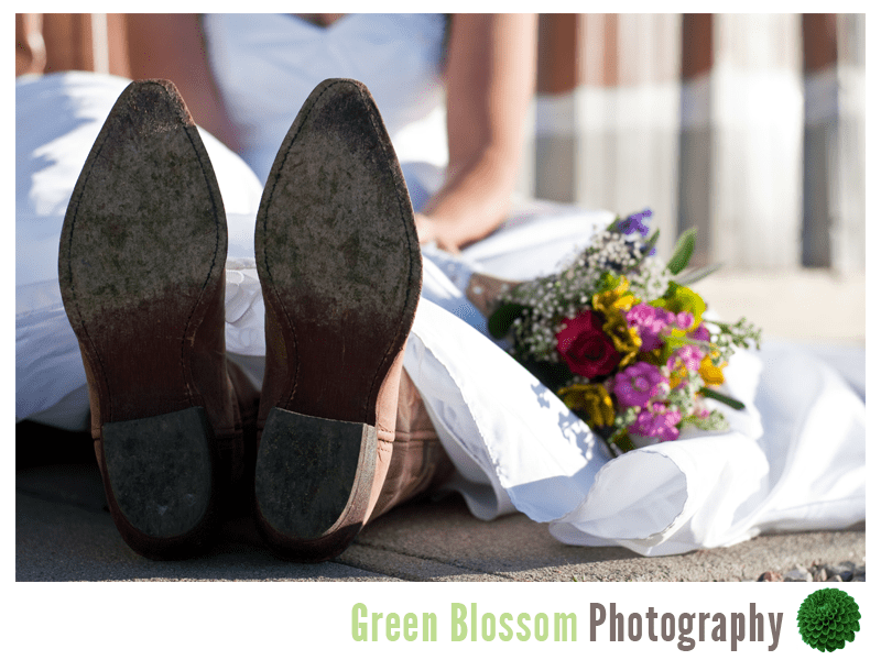 Colorado same-sex wedding boots and flowers photo