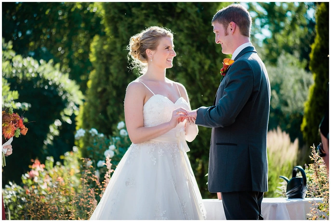 ring exchange in Romantic Gardens at Denver Botanic Gardens wedding by Denver wedding photographer Jennie Crate