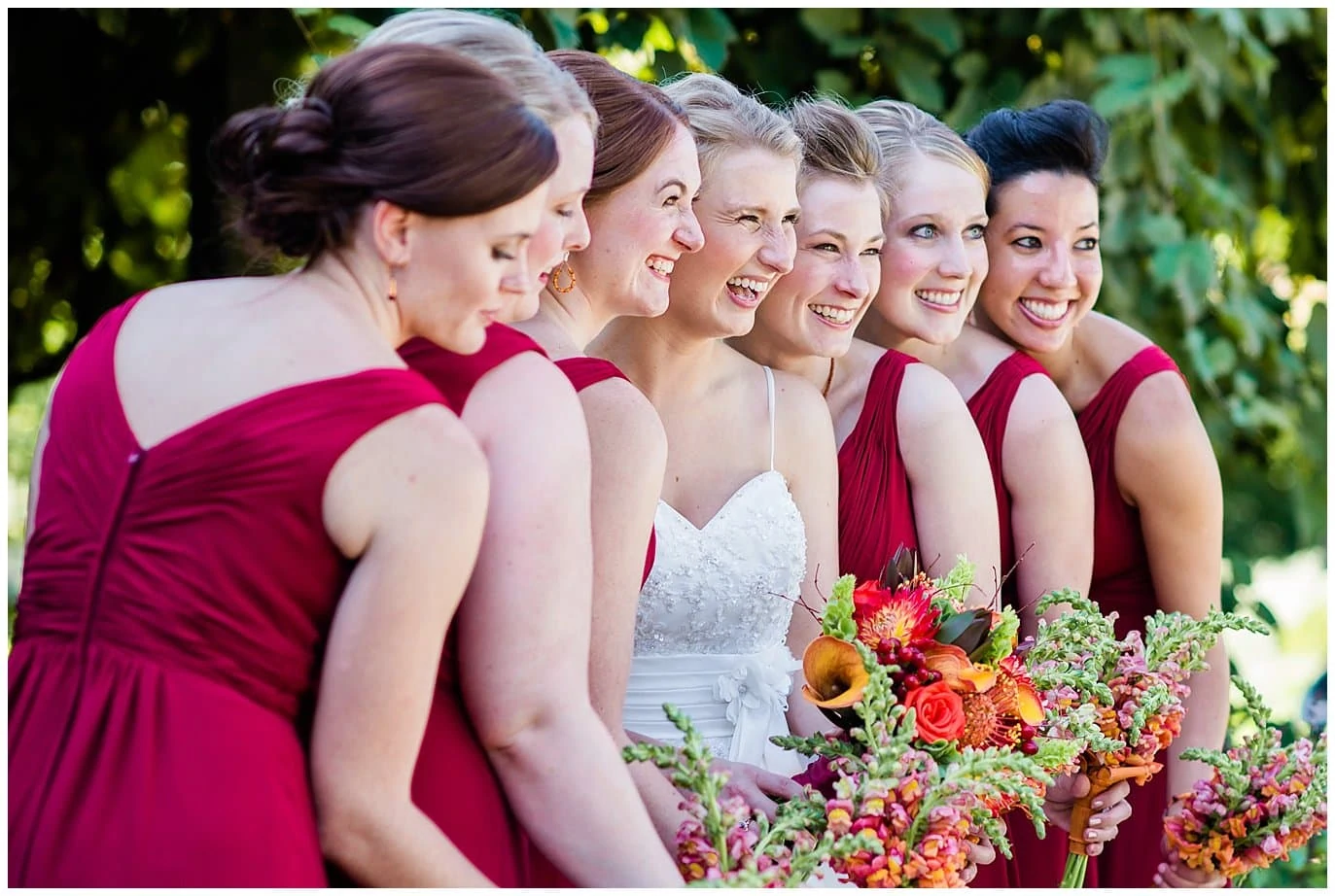 bridal party laughing before ceremony at Denver Botanic Gardens wedding by Denver Botanic Gardens wedding photographer Jennie Crate