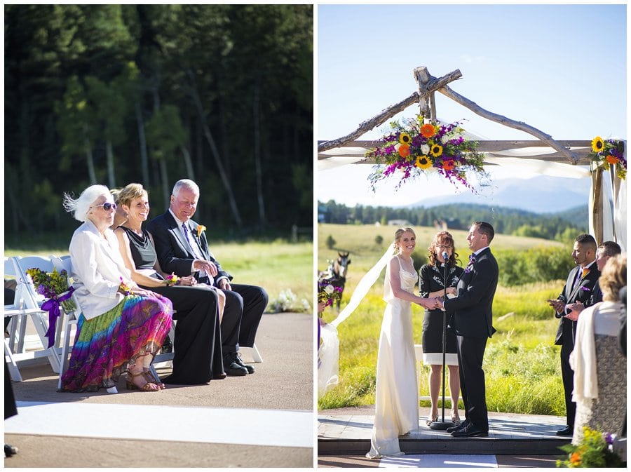 family watches bride and groom at ceremony at Deer Creek Valley Ranch wedding by Colorado wedding photographer Jennie Crate
