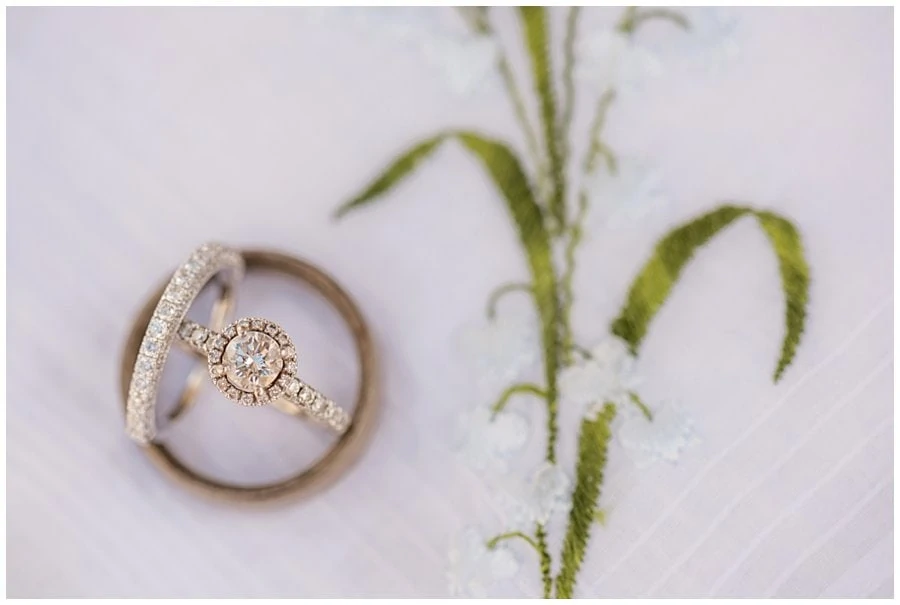 wedding ring and heirloom wedding hankerchief at Deer Creek Valley Ranch wedding by Denver wedding photographer Jennie Crate