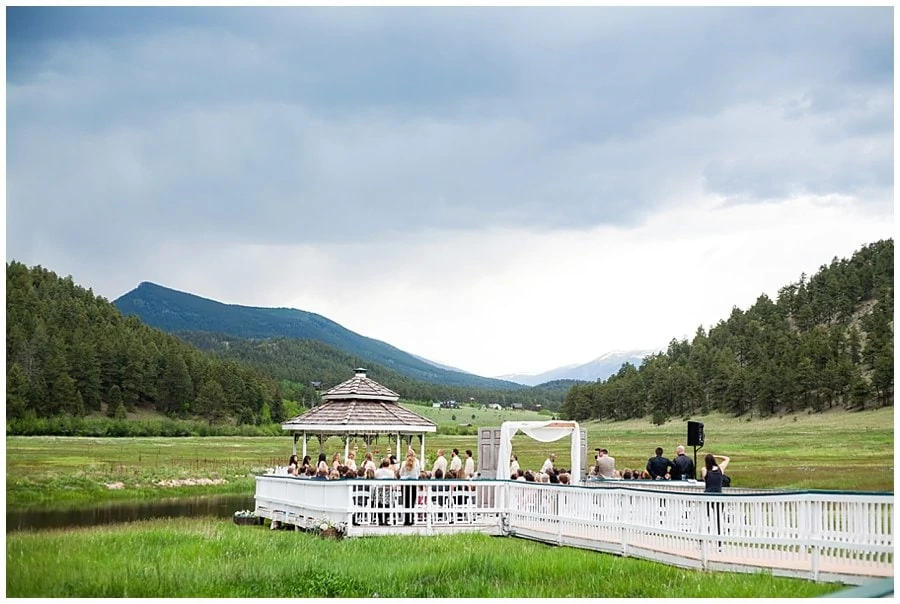 gazebo wedding ceremony at Deer Creek Valley Ranch wedding by Boulder wedding photographer Jennie Crate