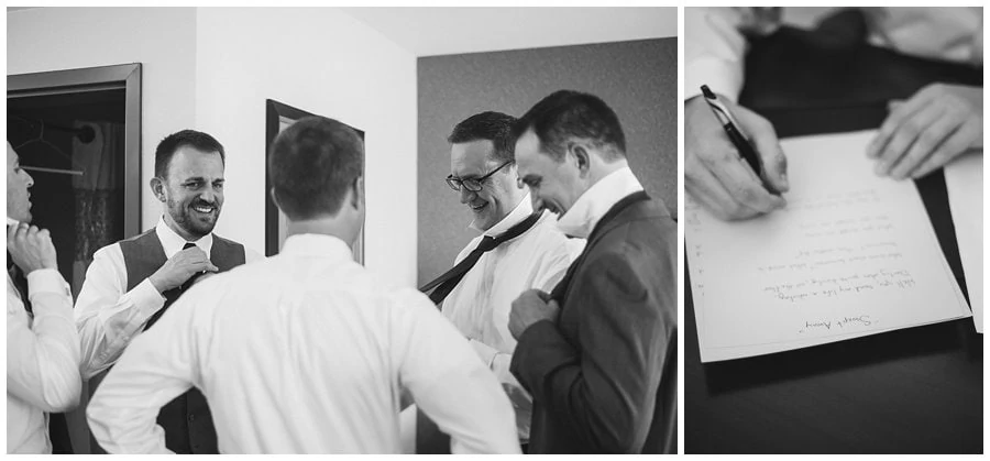 groom and groomsmen tying ties and writing vows at spring Denver Botanic Gardens at Chatfield Wedding by Denver wedding photographer Jennie Crate