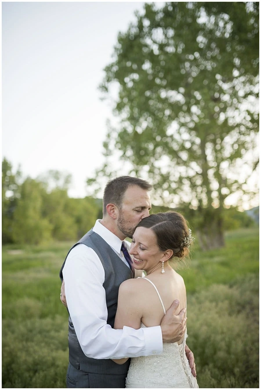 romantic sunset bride and groom portraits in field at spring Denver Botanic Gardens at Chatfield Wedding by Lyons wedding photographer Jennie Crate
