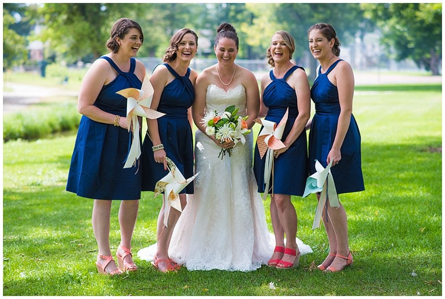 bridal party with pinwheel flowers photo