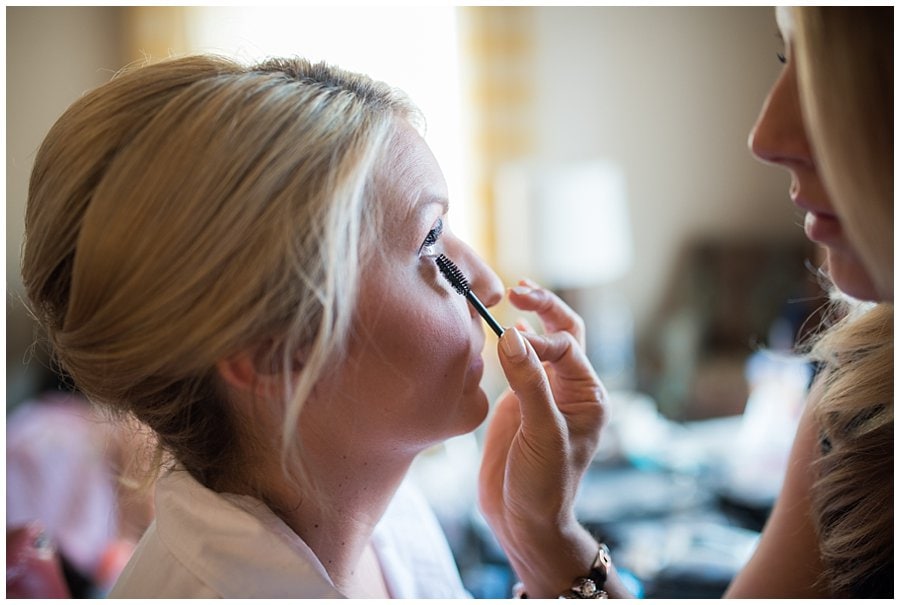 bride getting ready on wedding day in downtown Denver at blanc Denver wedding by Denver Wedding Photographer Jennie Crate Photographer