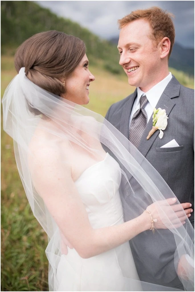 bride and groom after wedding ceremony at Piney River Ranch wedding by Colorado Wedding photographer Jennie Crate, Photographer