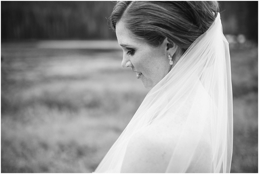 bride with elegant veil at Piney River Ranch wedding by Piney River Ranch Wedding photographer Jennie Crate, Photographer