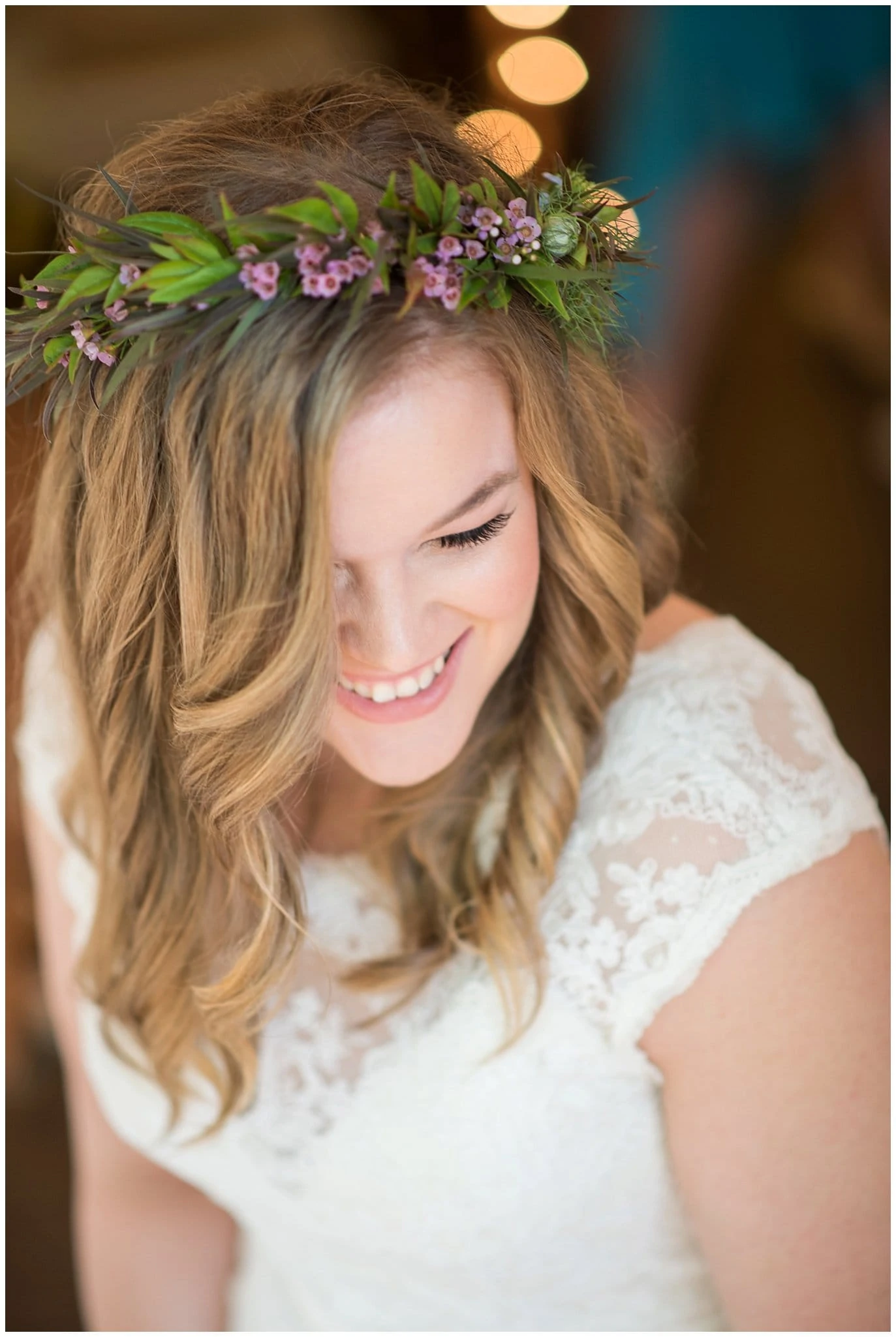 bride with flower crown at Lyons Riverbend wedding by Lyons wedding photographer Jennie Crate