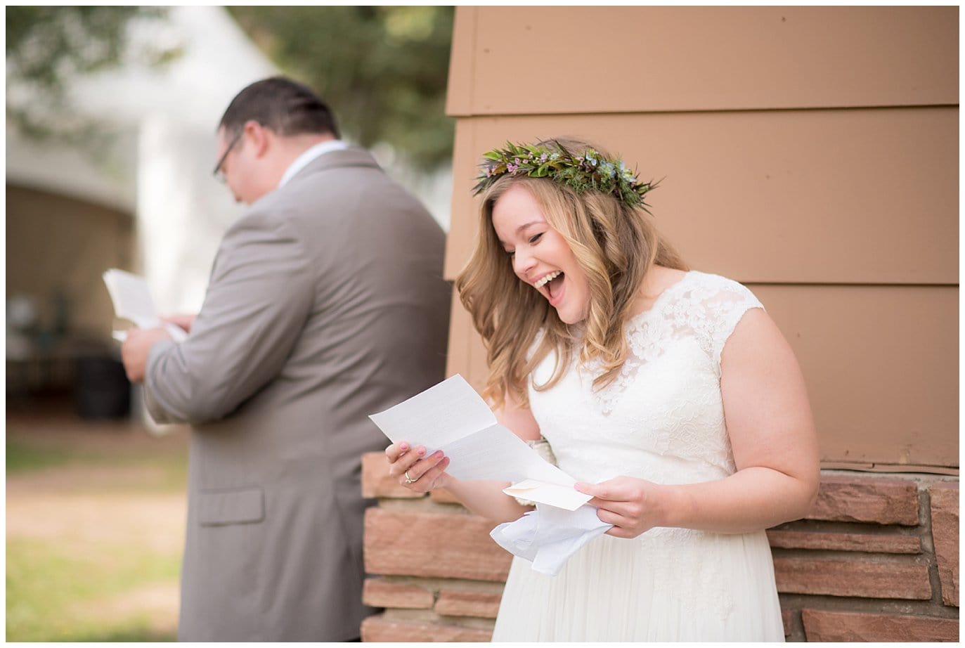 bride and groom reading letters to each other at Lyons Riverbend wedding by Lyons wedding photographer Jennie Crate