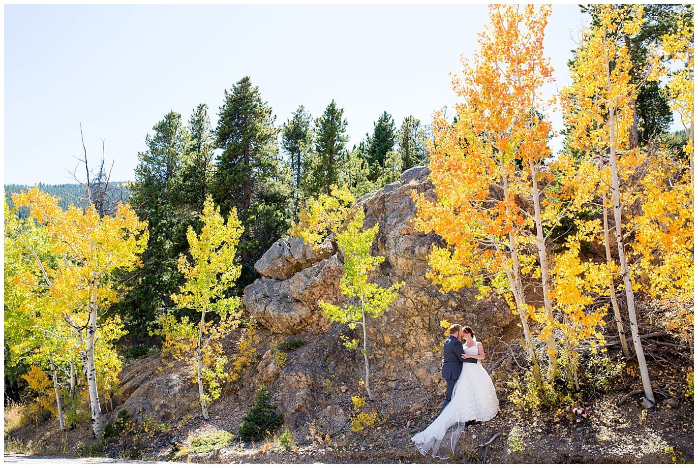 bride and groom up Lookout Mountain surrounded by fall leaves by Golden wedding photographer Jennie Crate