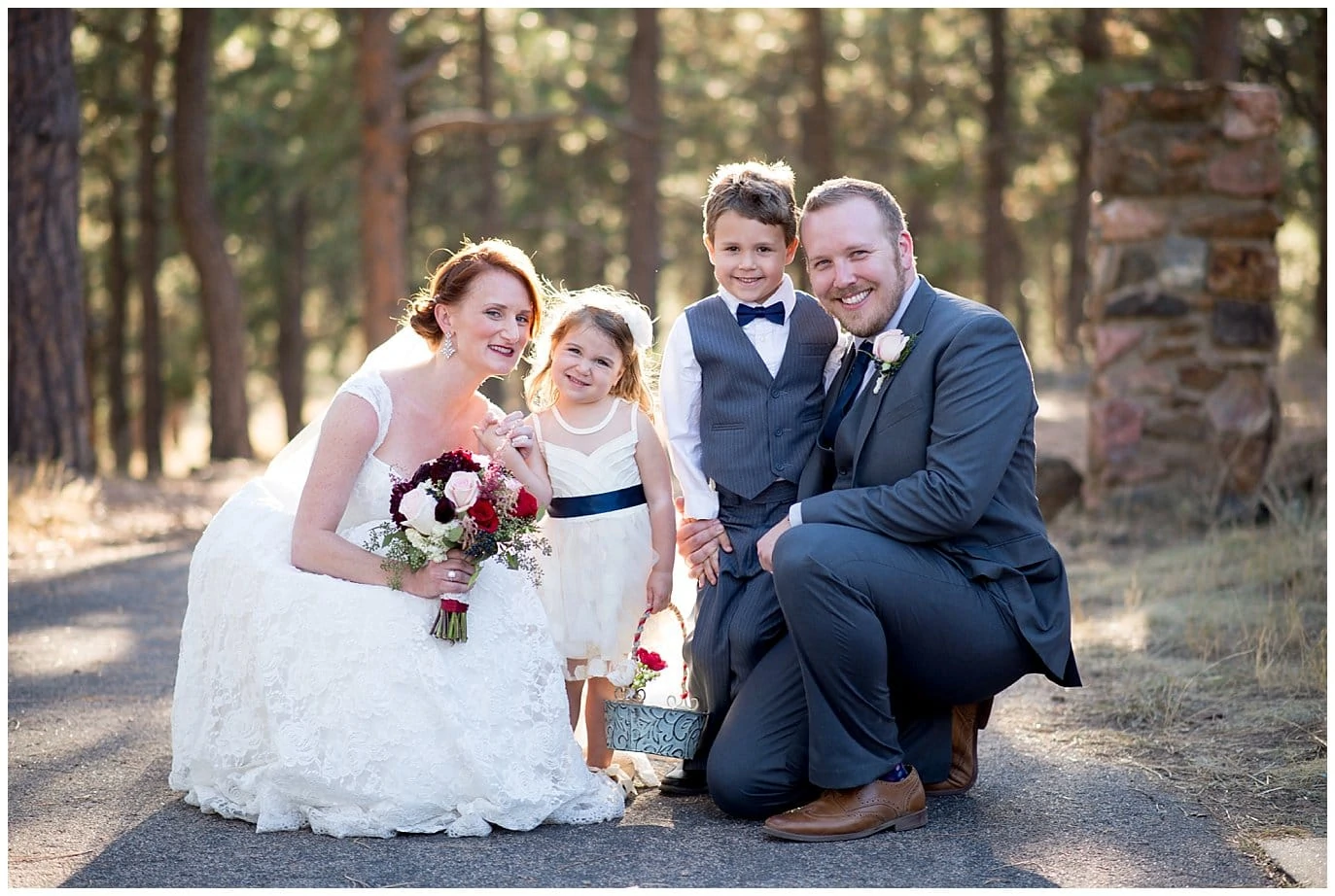 bride and groom with flower girl and ring bearer at Lookout Mountain Mansion Wedding by Golden wedding photographer Jennie Crate