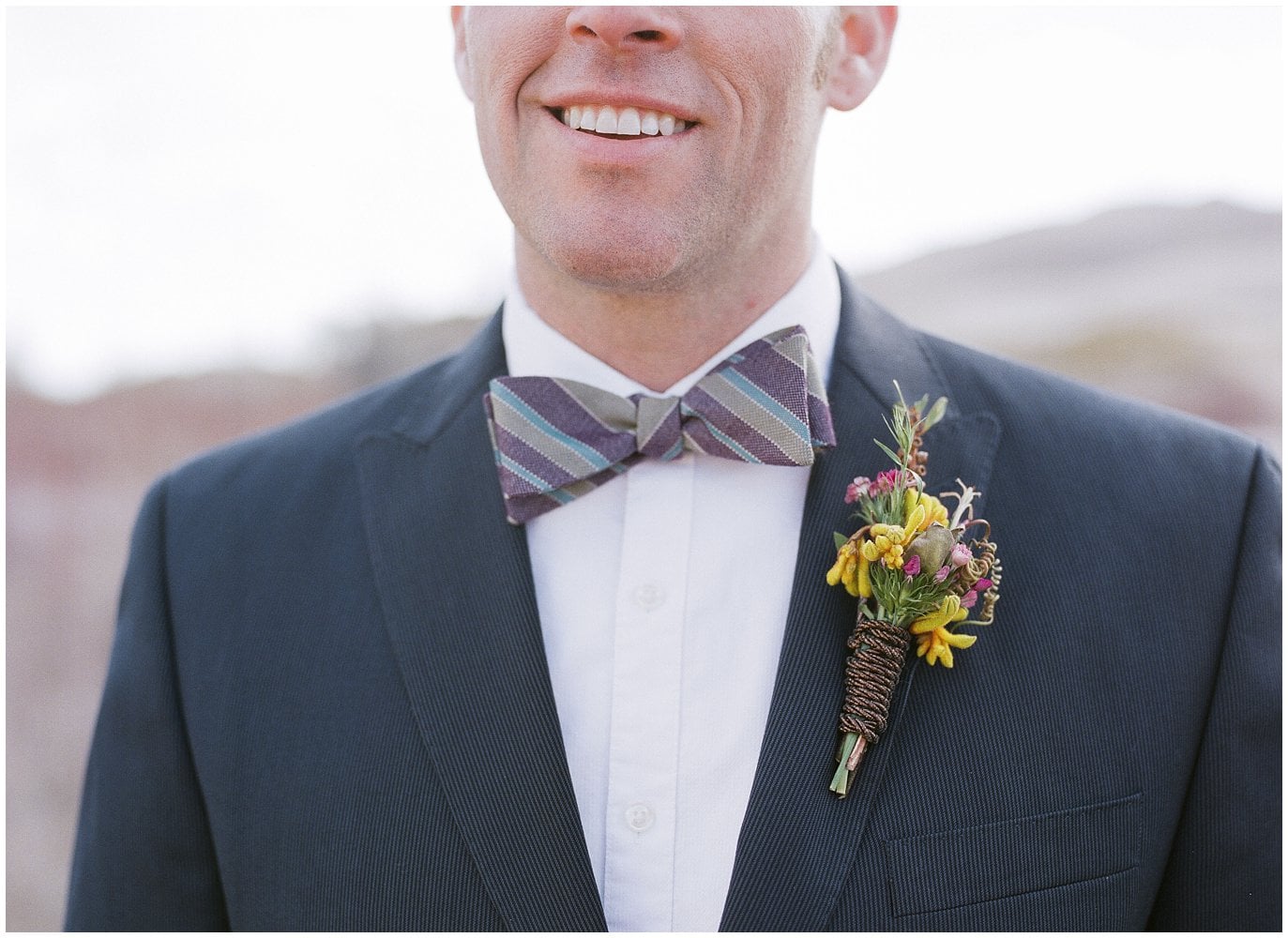 bowtie and boutonniere on groom