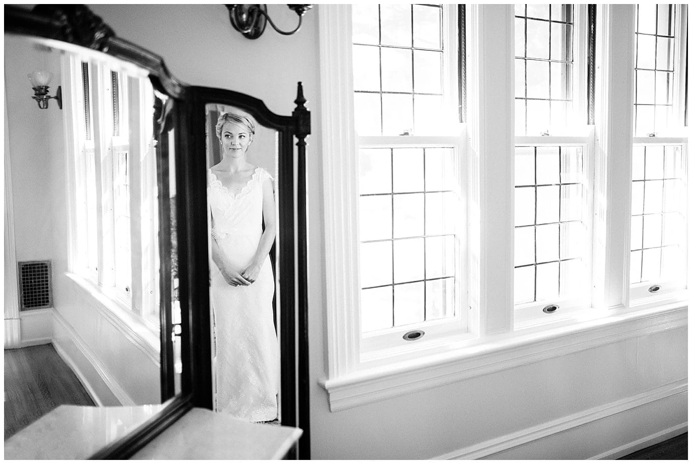 reflection of bride in mirror photo