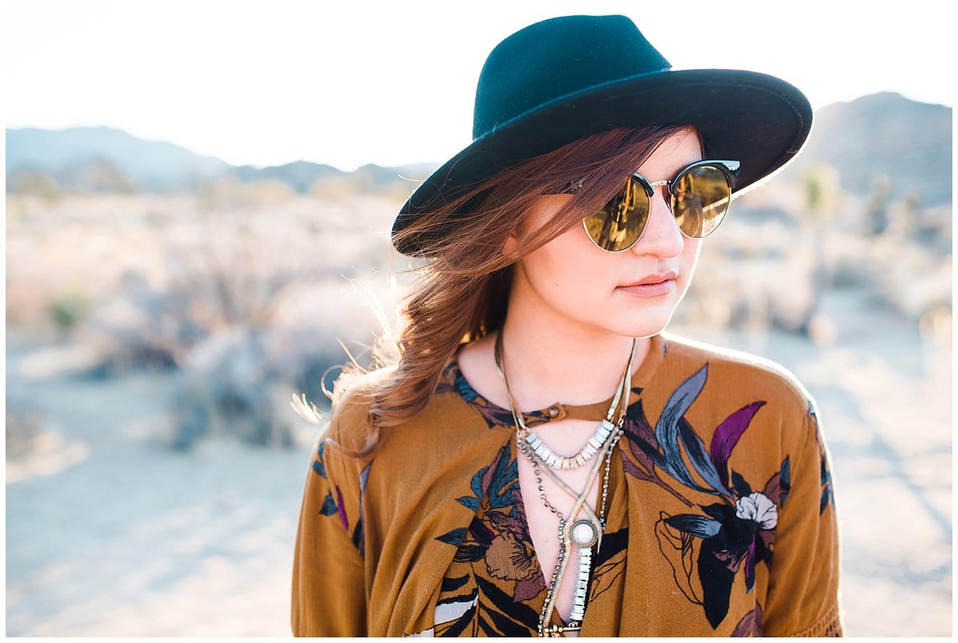 girl with free people hat and shirt in desert