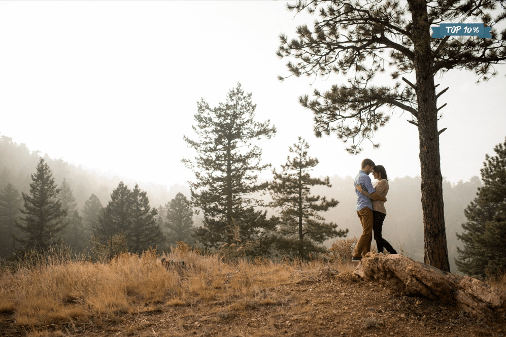 foggy engagement in genesee park colorado photo