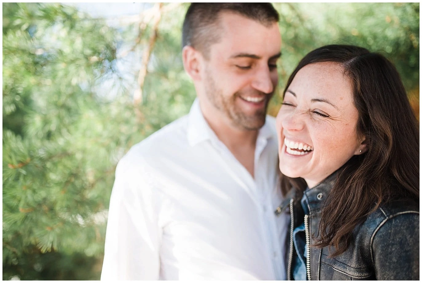 engaged couple laughing in downtown Louisville photo
