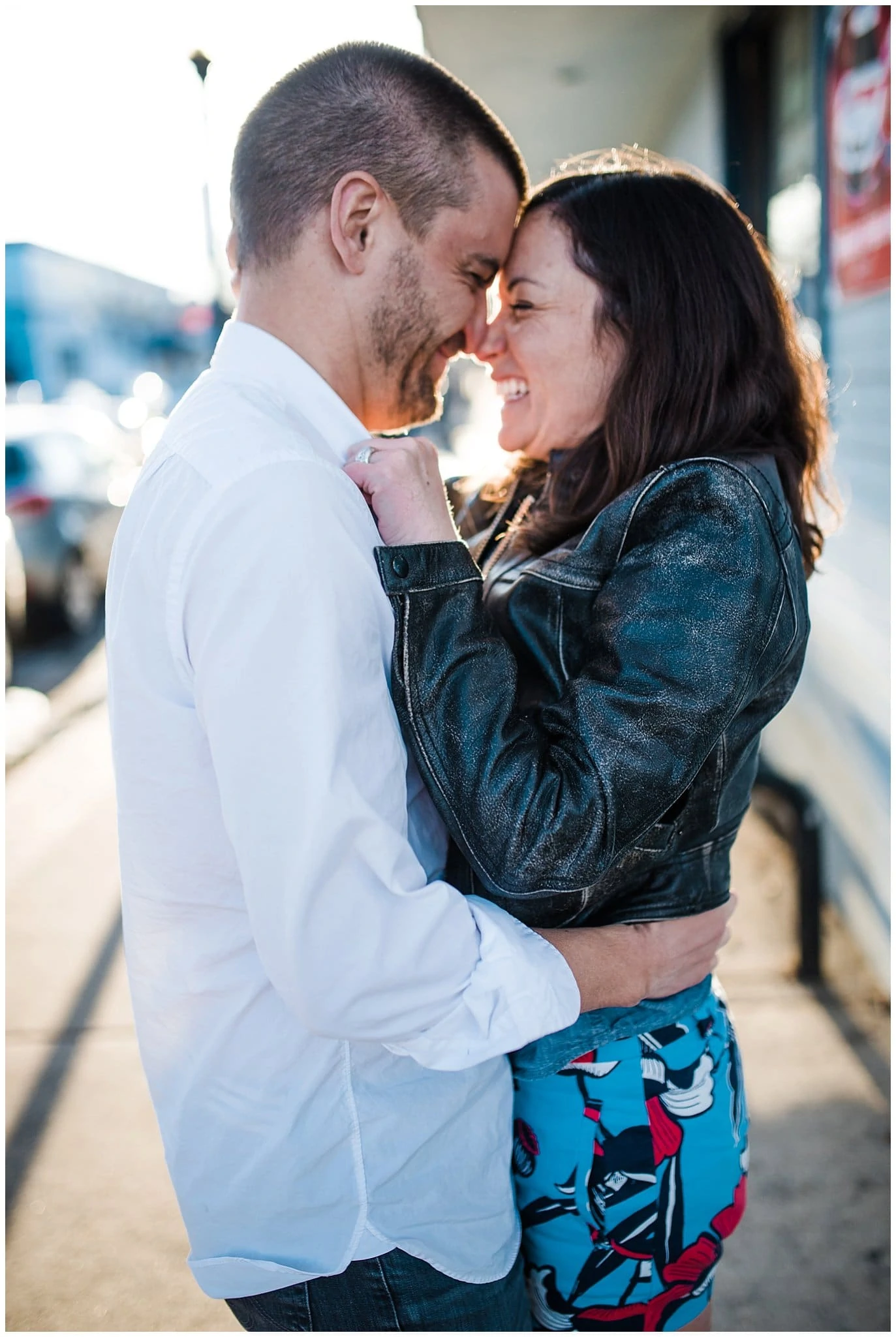 intimate giggly engagement photo