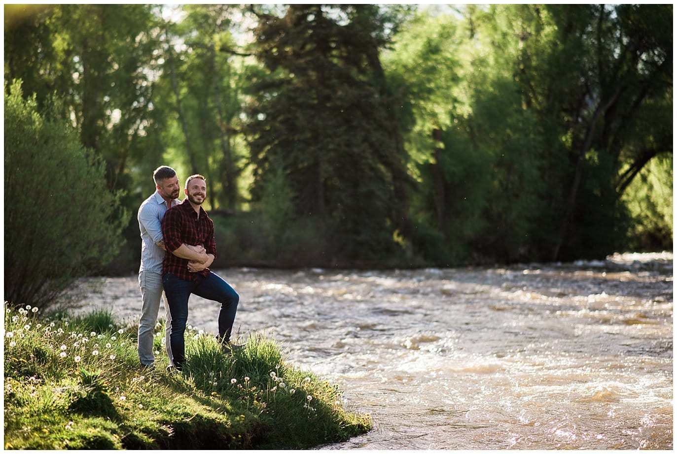 lgbt engagement photo by river