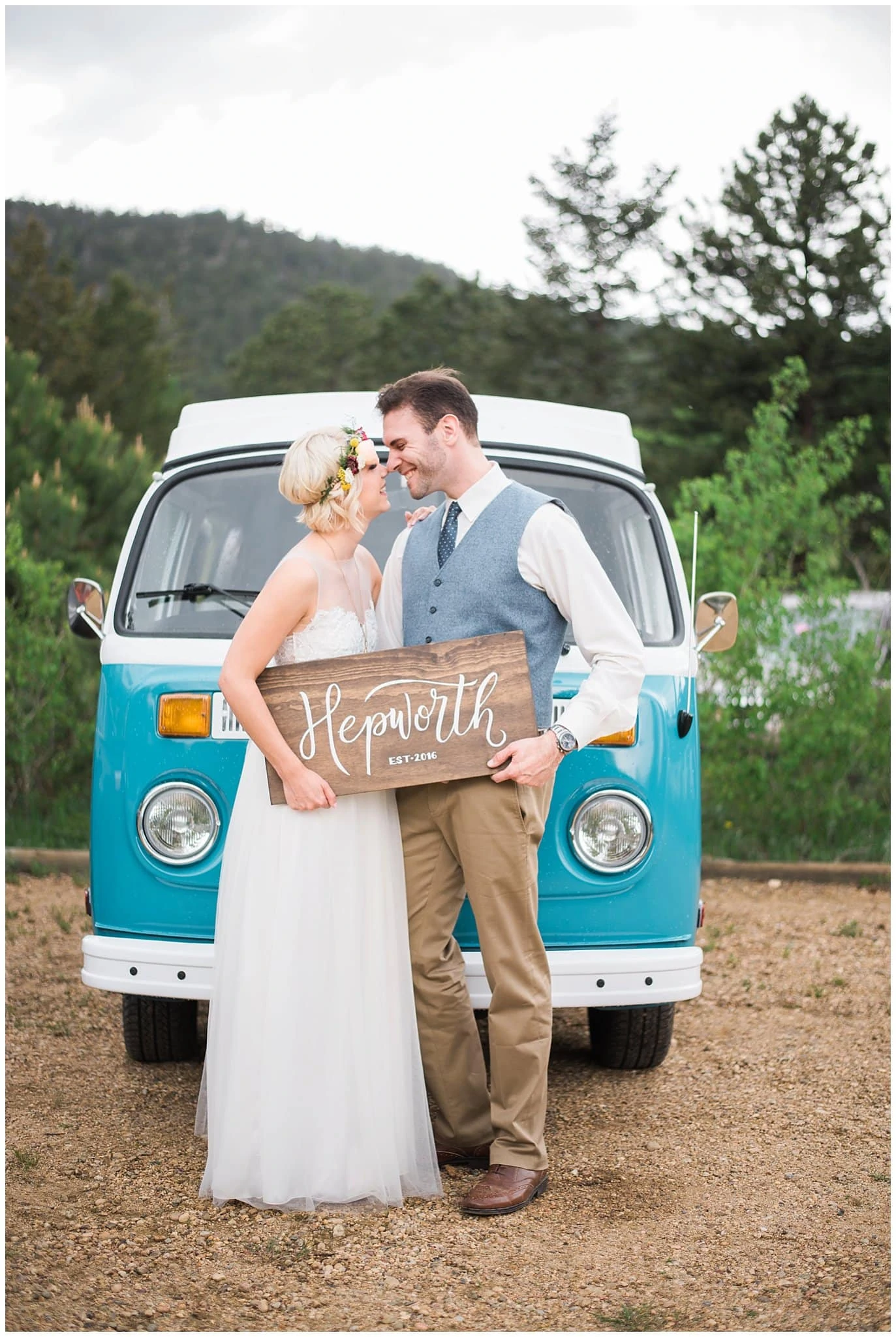 bride and groom in front of VW bus