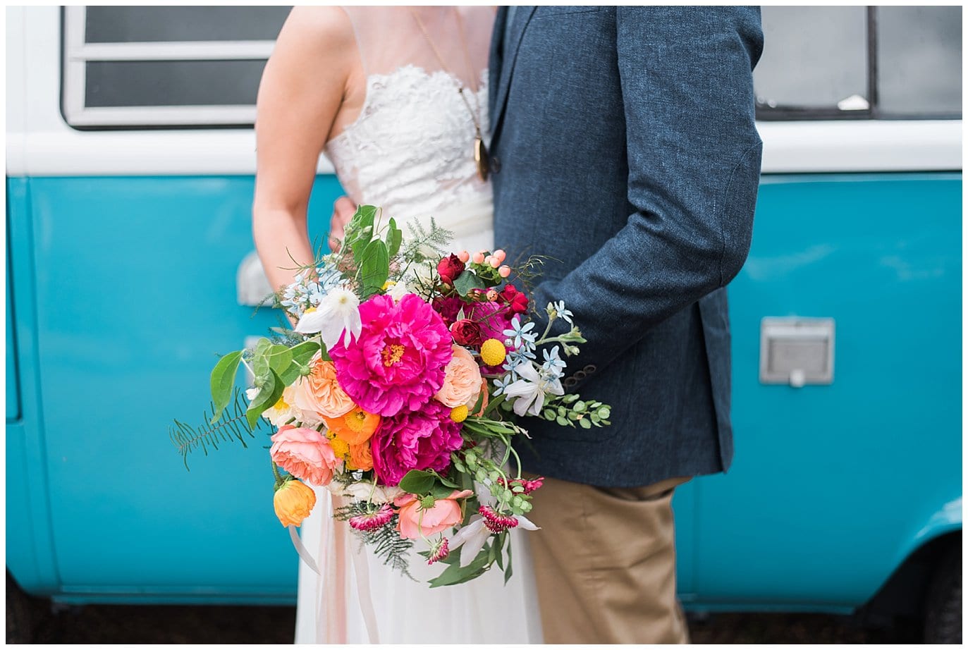 colorful flowers and teal VW bus photo