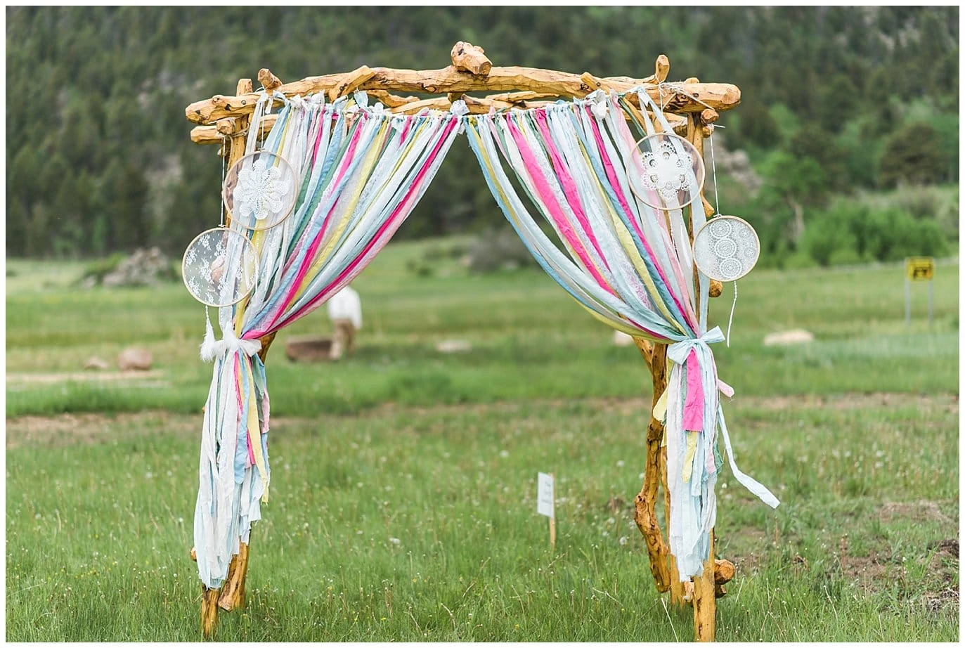 wedding arch with fabric streamers photo