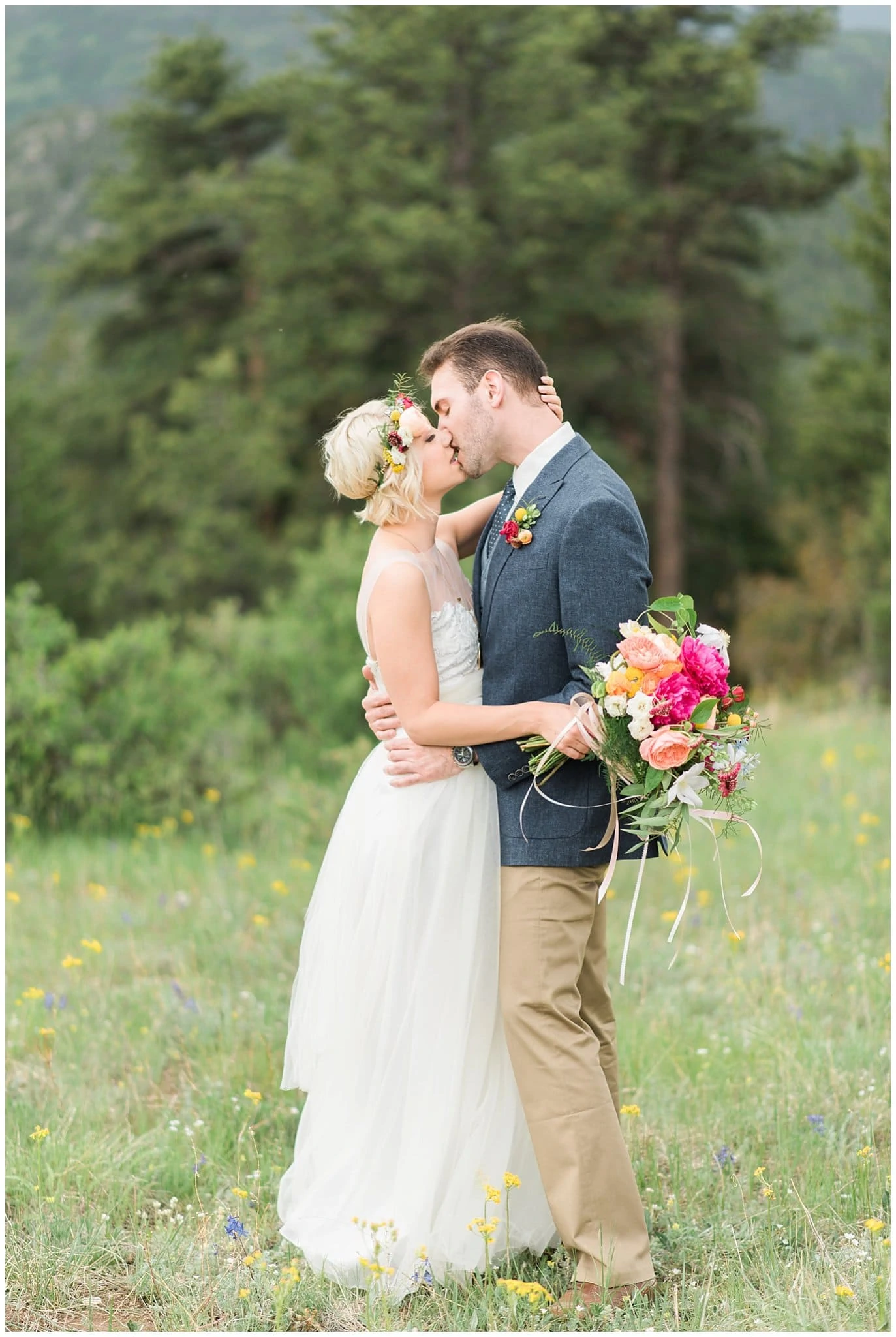 couple in mountains on wedding day photo