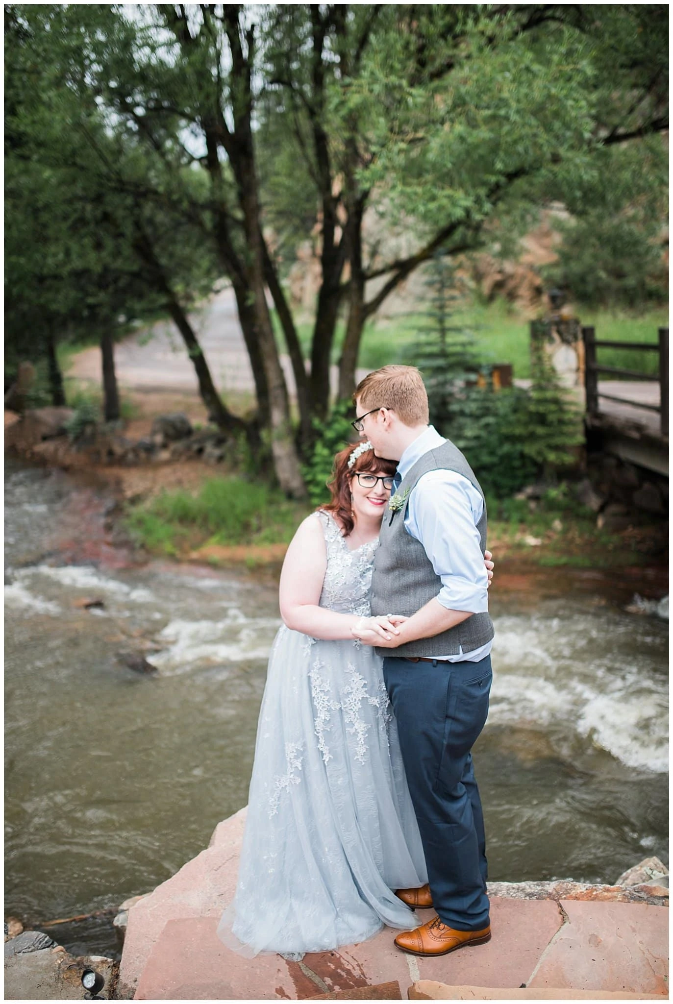 Colorado wedding couple by river photo
