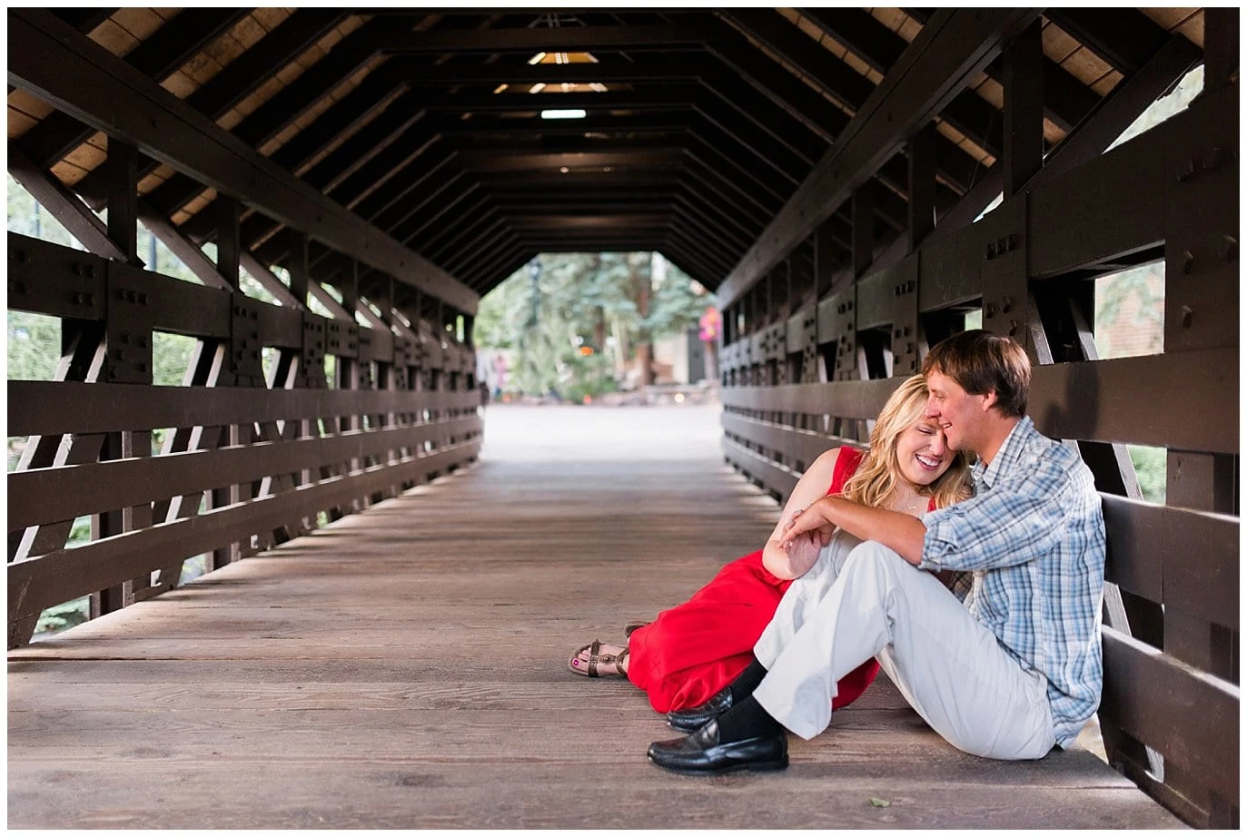 covered bridge in vail colorado engagement photo