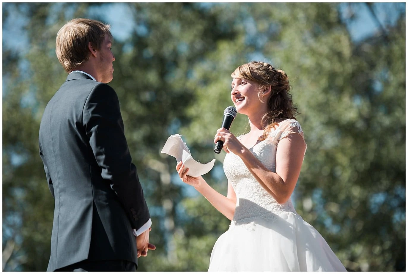 bride reading vows at Colorado mountain wedding photo