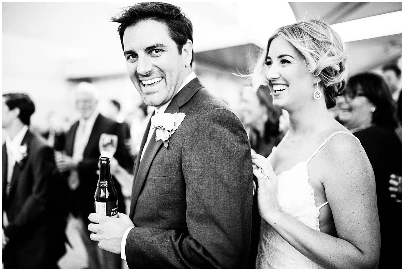 couple laughing during wedding day toasts photos