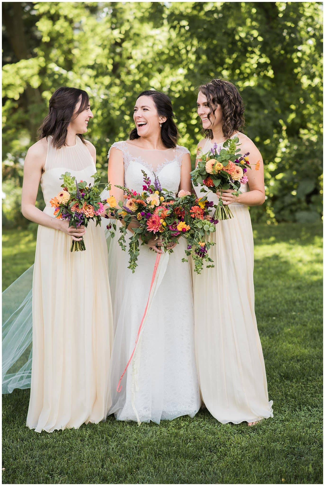 bridesmaids in pink at Lyons Farmette wedding by Lyons Wedding Photographer Jennie Crate
