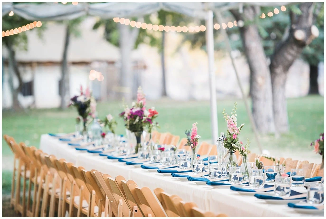 outdoor dining colorado wedding at Lyons Riverbend Wedding by Longmont Wedding Photographer Jennie Crate