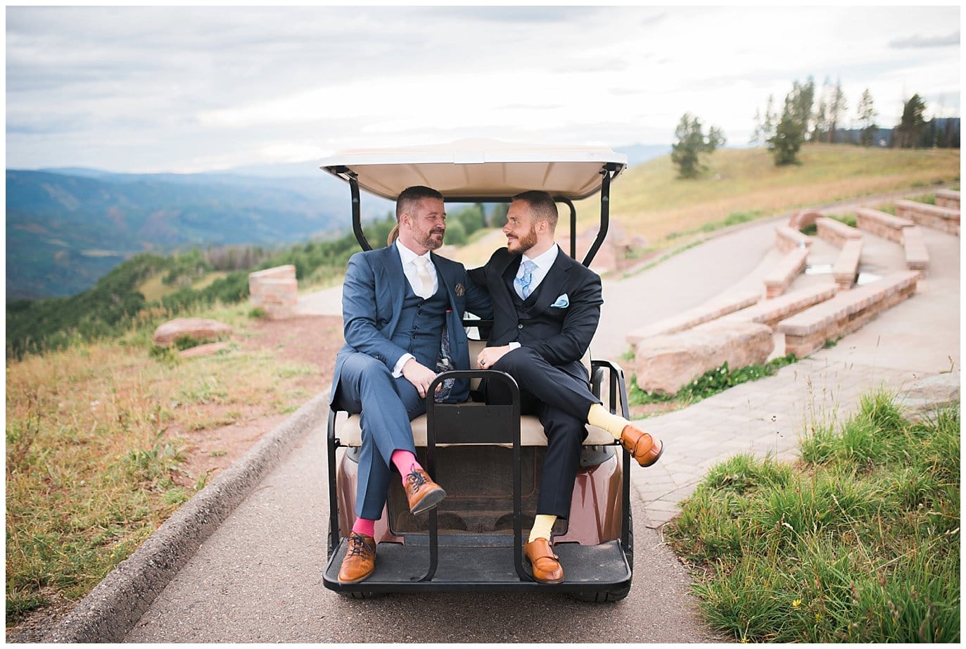 grooms riding in golf cart on top of Vail Wedding Deck