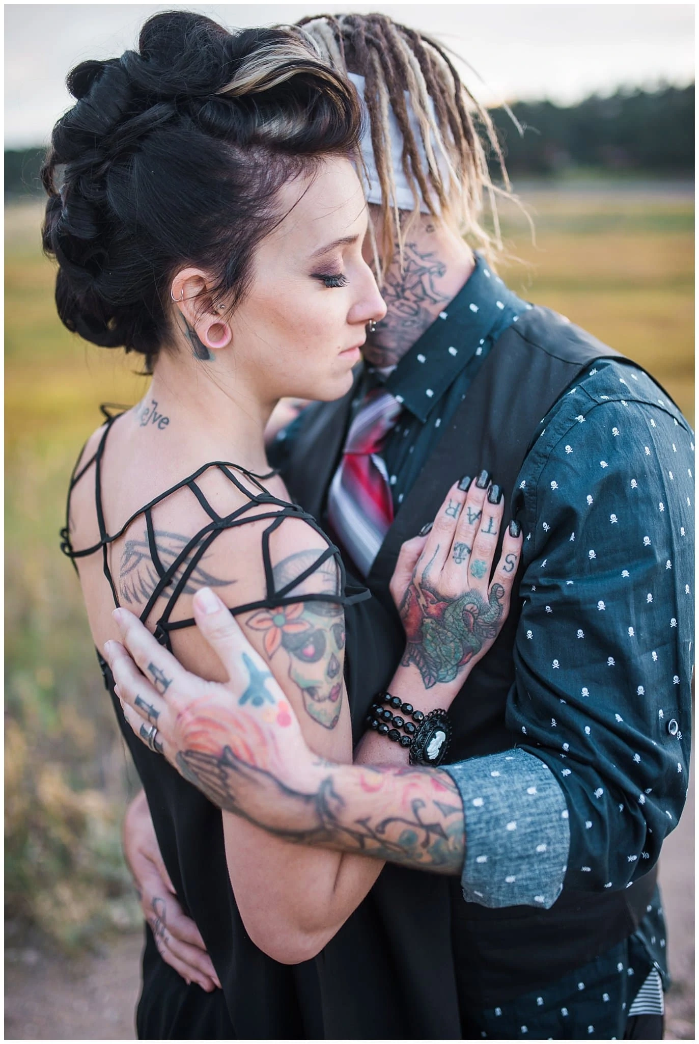 bride and groom with tattoos photo