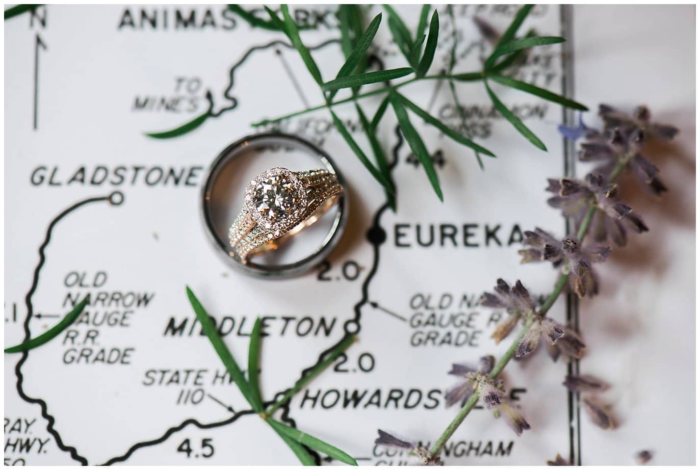 diamon engagement ring on Colorado map at Eureka Lodge Wedding by Eureka Wedding Photographer Jennie Crate