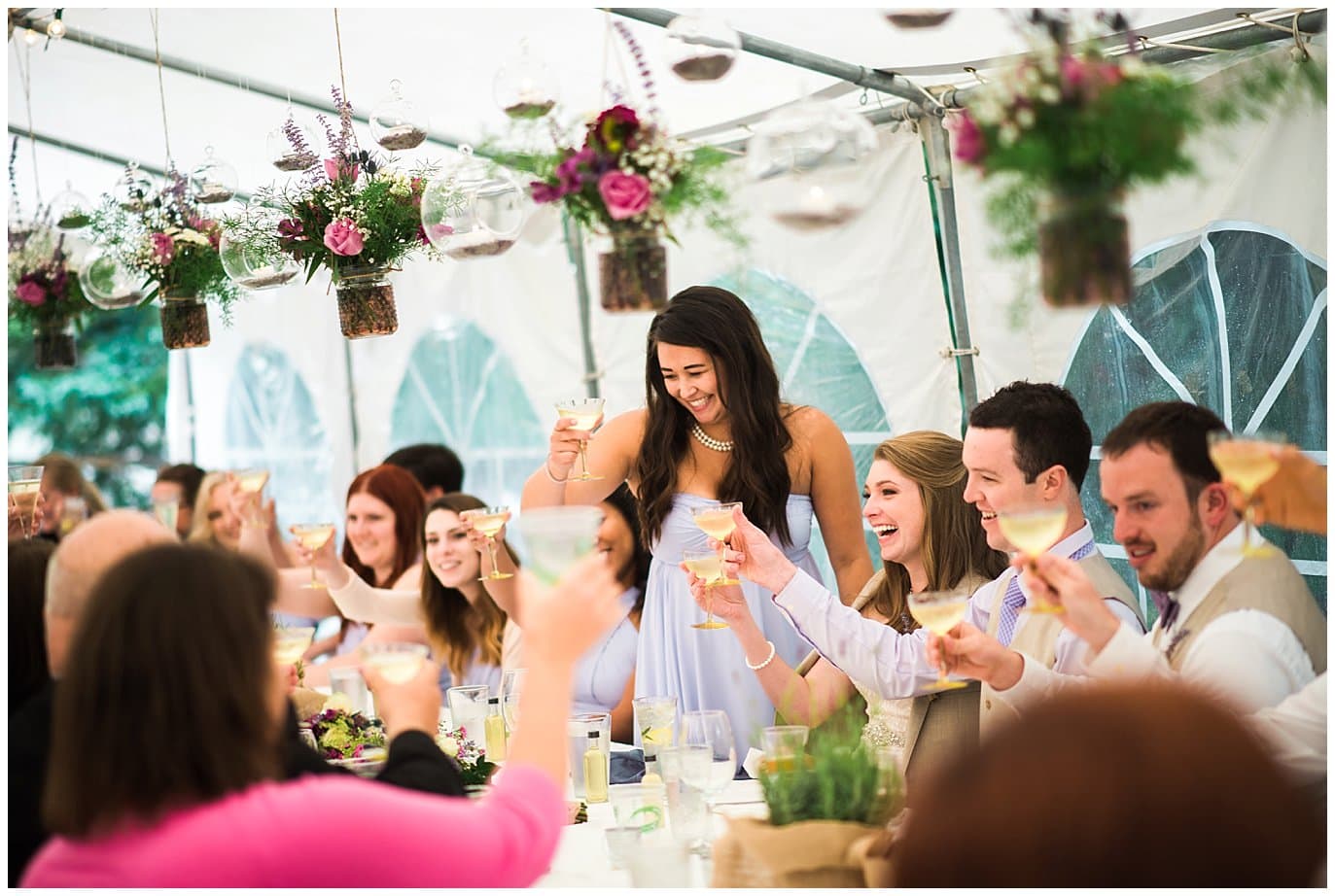 toasts at Eureka Lodge Wedding by Silverthorne Wedding Photographer Jennie Crate