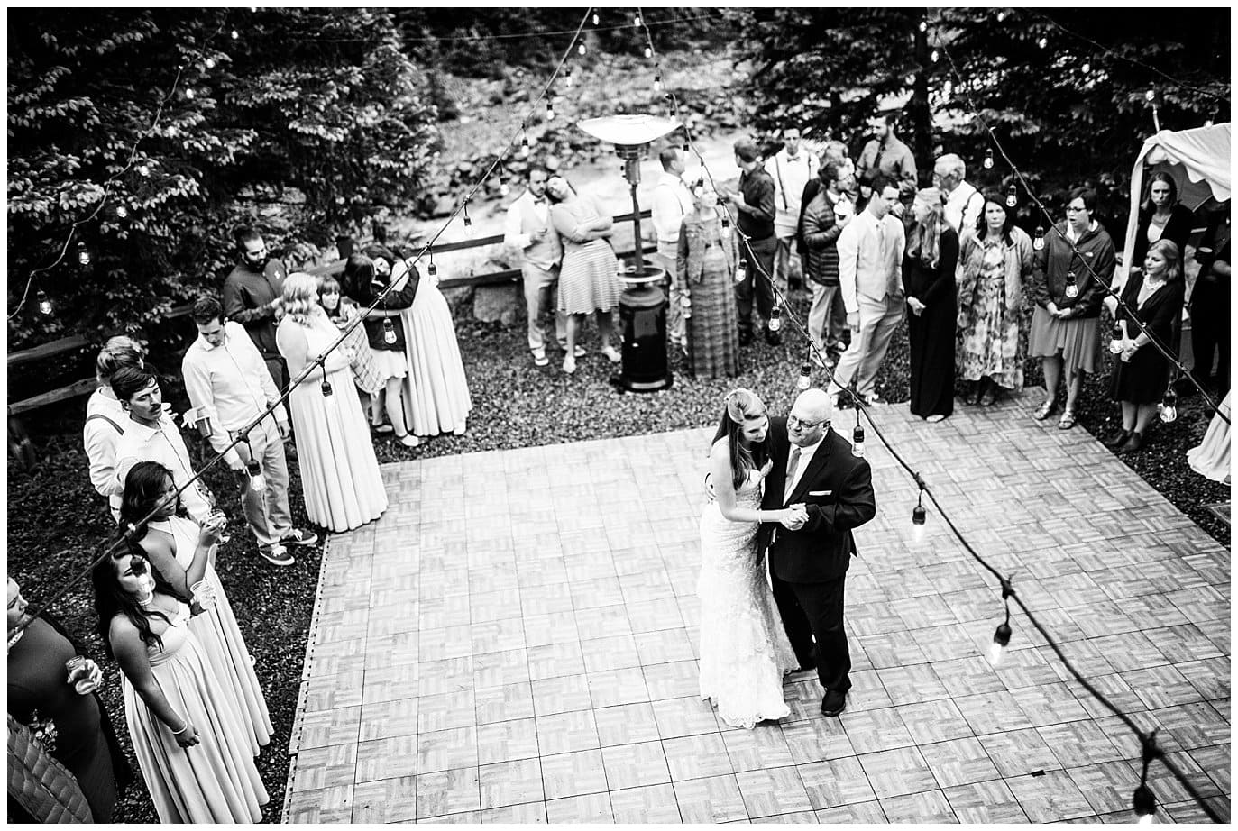 father of the bride dance in evergreen forest at Eureka Lodge Wedding by Breckenridge Wedding Photographer Jennie Crate