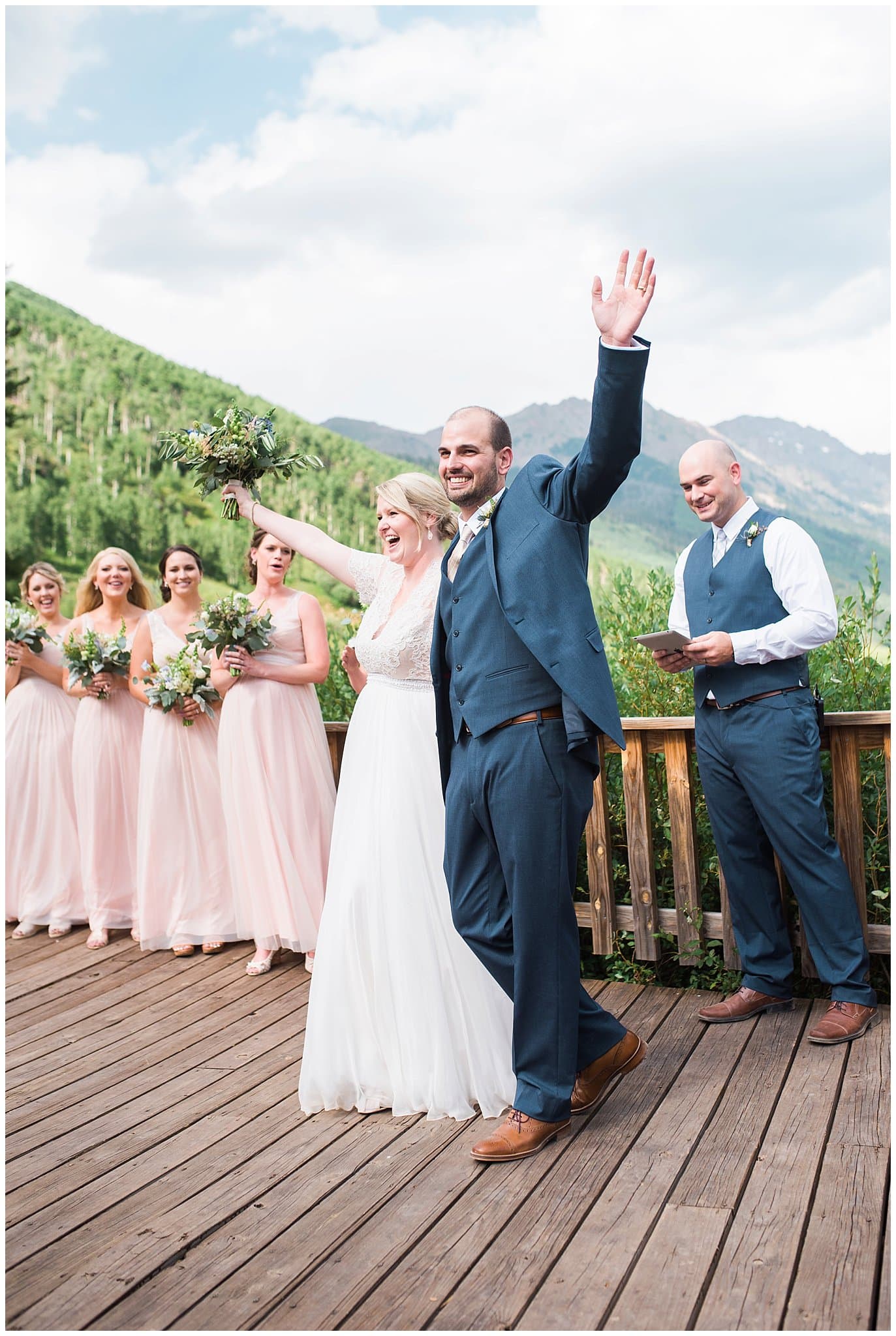 bride and groom cheering after wedding ceremony at Piney River Ranch wedding by Vail wedding photographer Jennie Crate photographer
