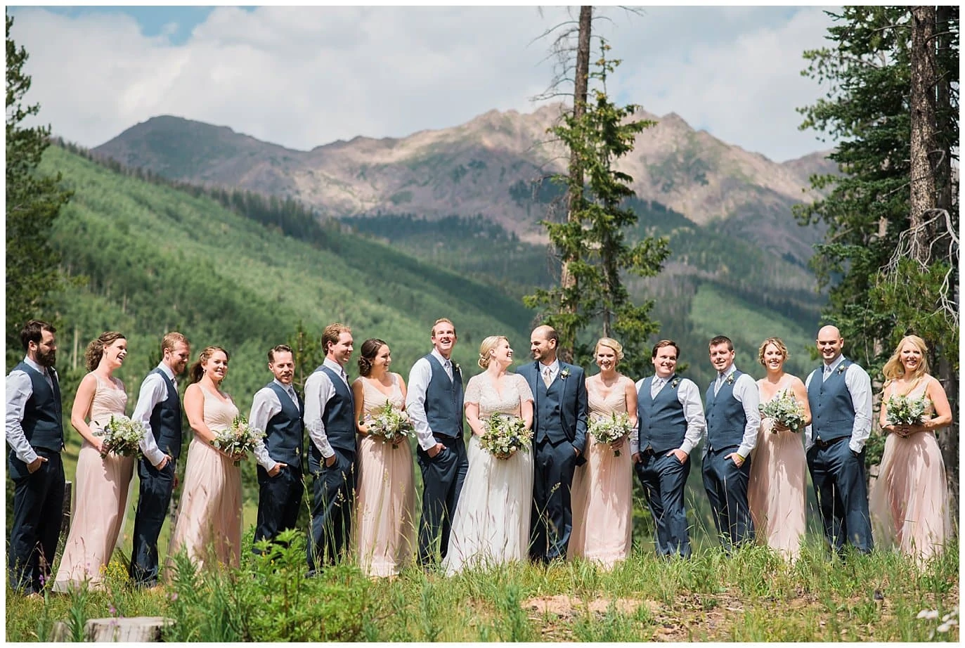 bridal party in front of lake at Piney River Ranch wedding by Beaver Creek Wedding photographer Jennie Crate, Photographer