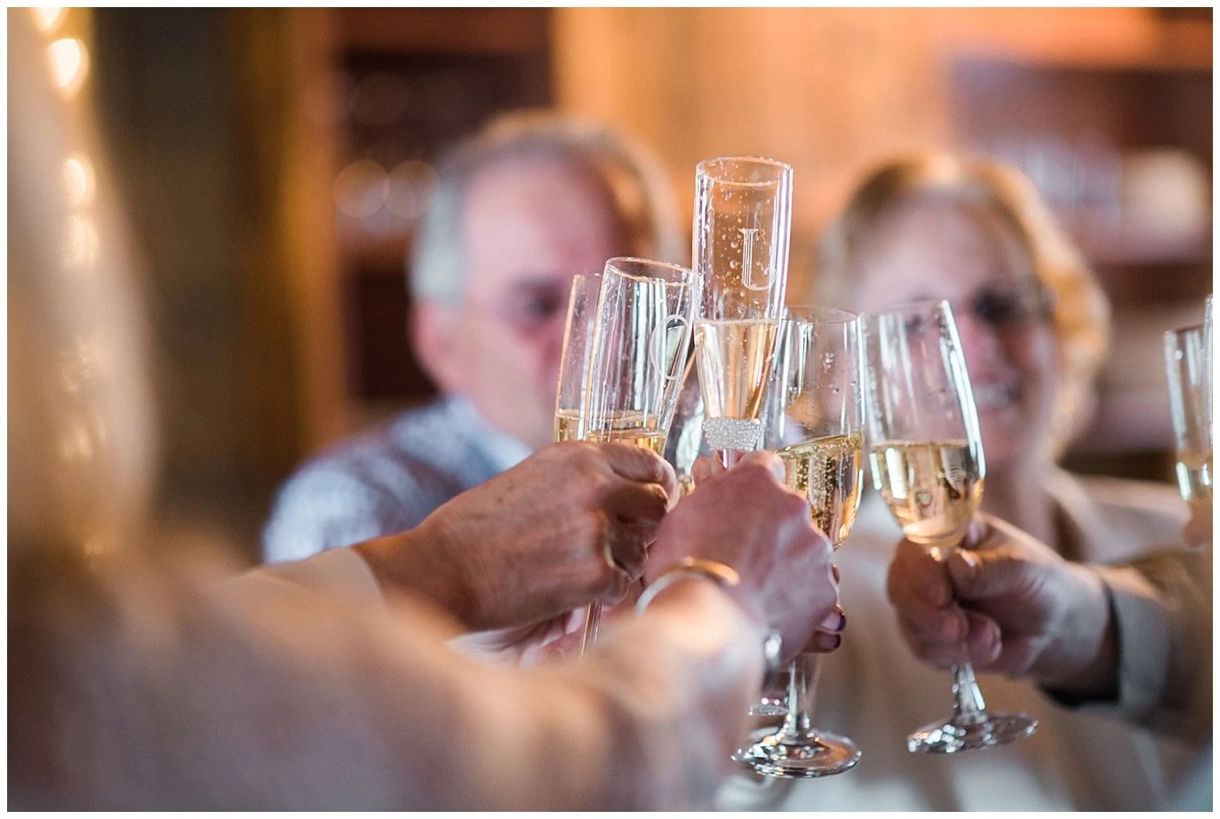 champagne toast at winter wedding photo