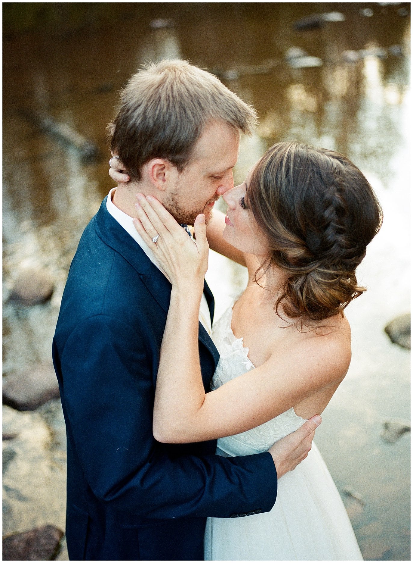 romantic wedding day kiss at Piney River Ranch intimate wedding by Aspen wedding photographer Jennie Crate Photographer