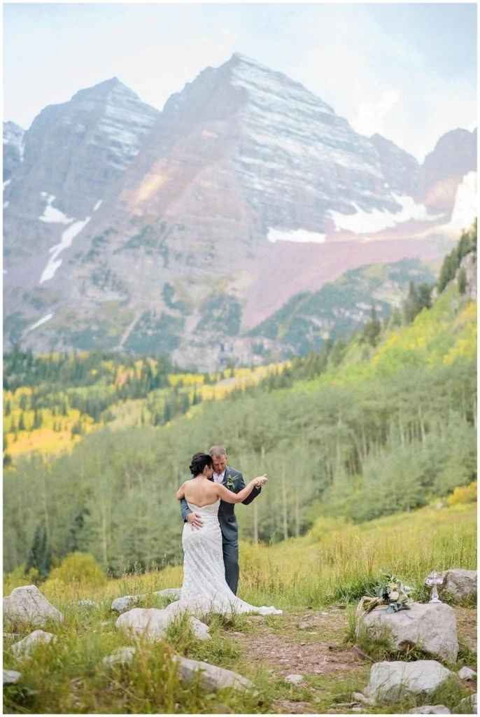 intimate first dance at Maroon Bells elopement by Colorado Elopement Photographer Jennie Crate Photographer