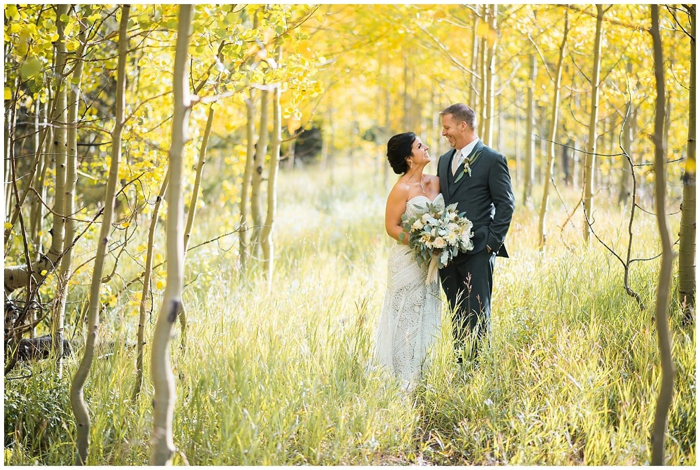 bride and groom in colorado aspens photo