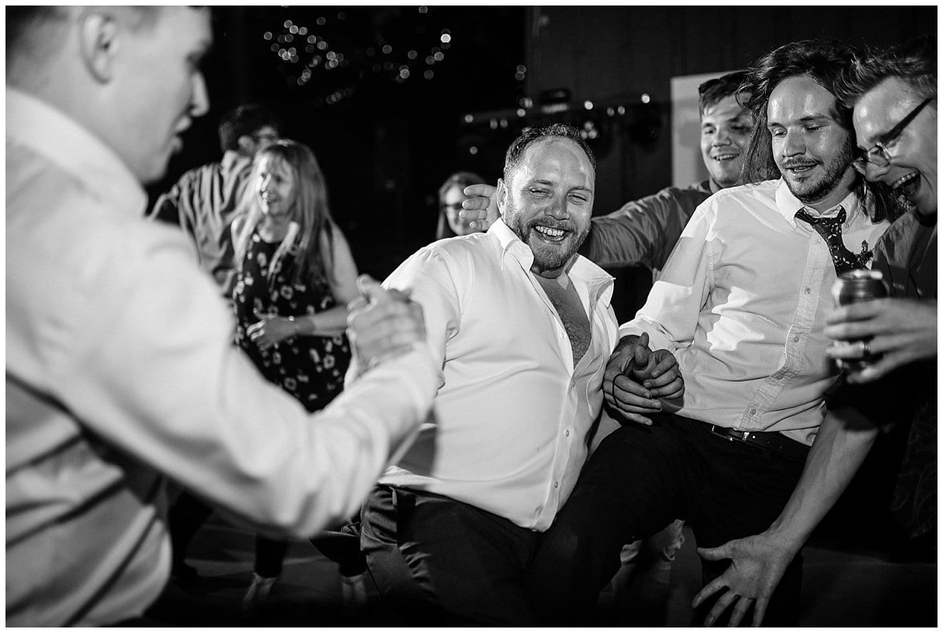 groom dancing at outdoor Colorado wedding at Denver Botanic Gardens at Chatfield Summer Wedding by Chatfield Farms wedding photographer Jennie Crate photographer