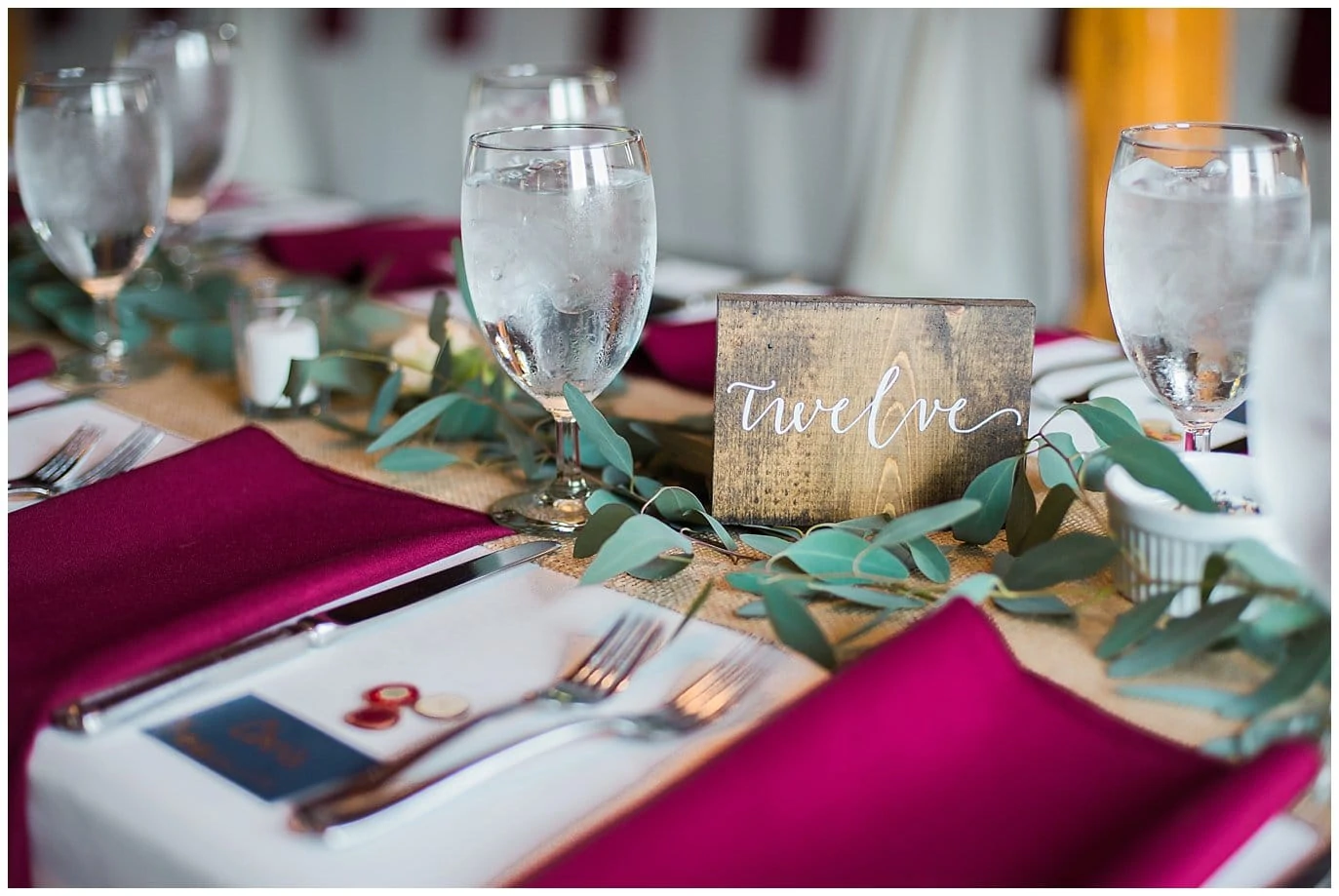 wooden table numbers with caligraphy at Denver Botanic Gardens at Chatfield Summer Wedding by Denver Botanic Gardens wedding photographer Jennie Crate photographer