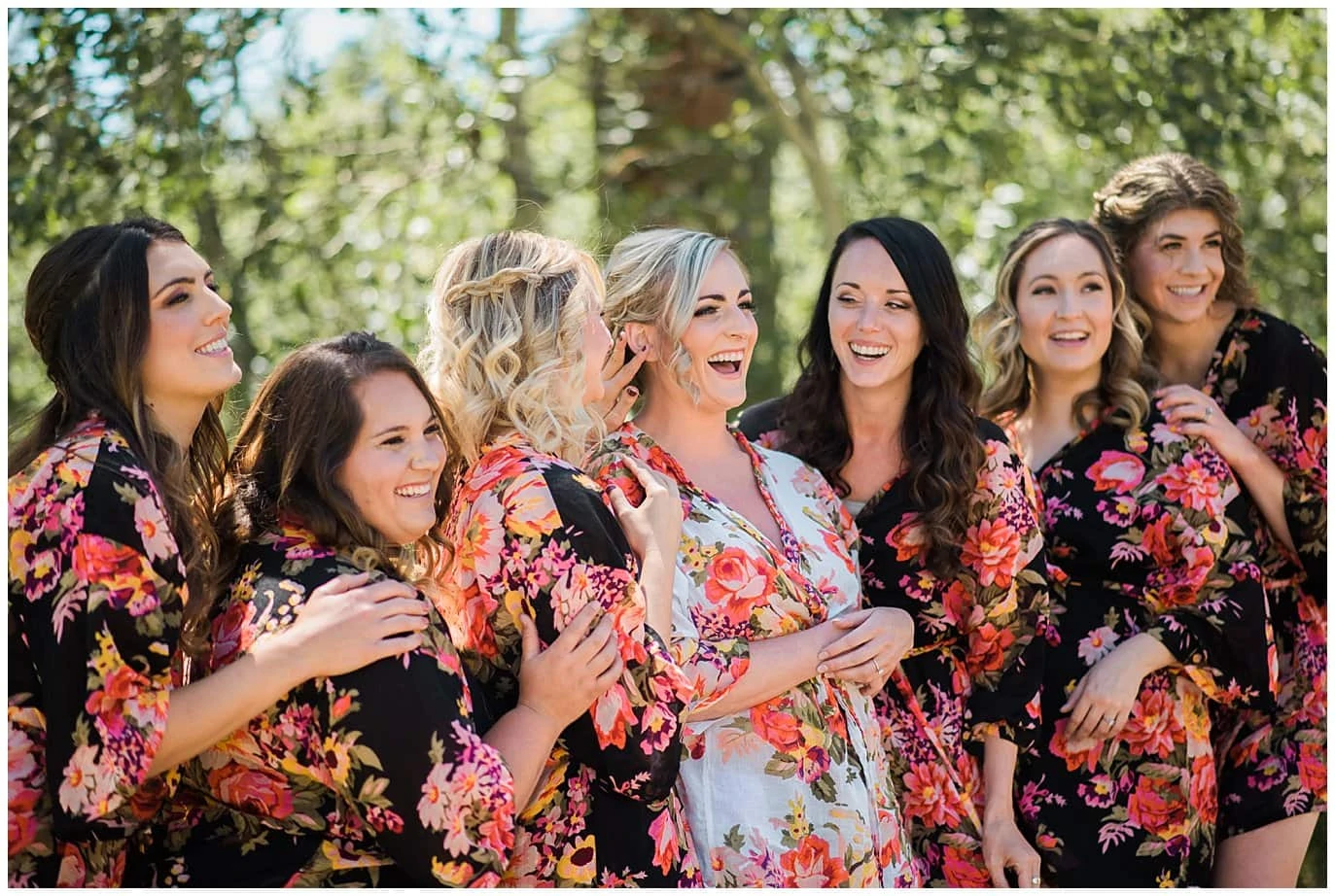 bridesmaids in floral robes photo