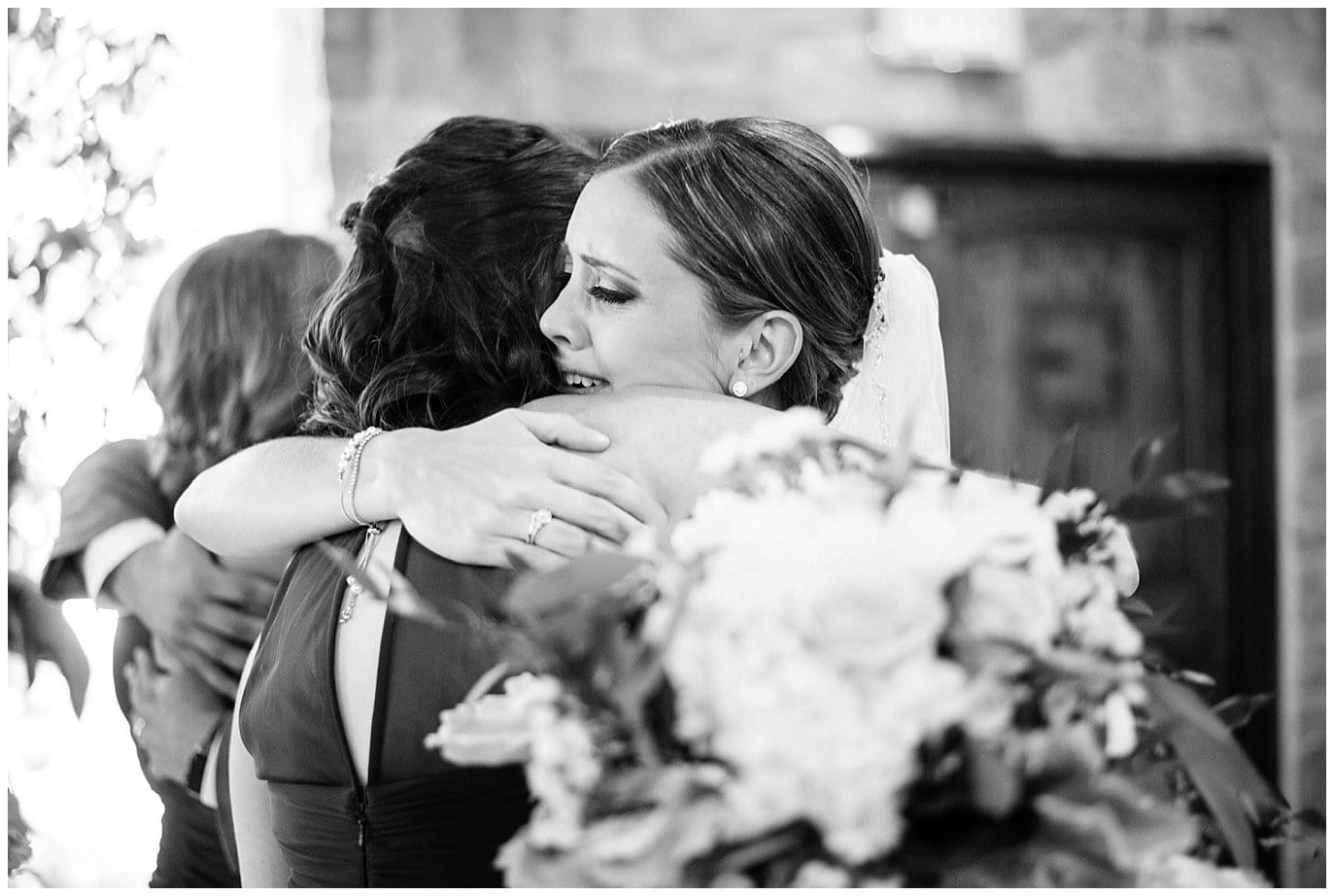 emotional hugs wedding photo
