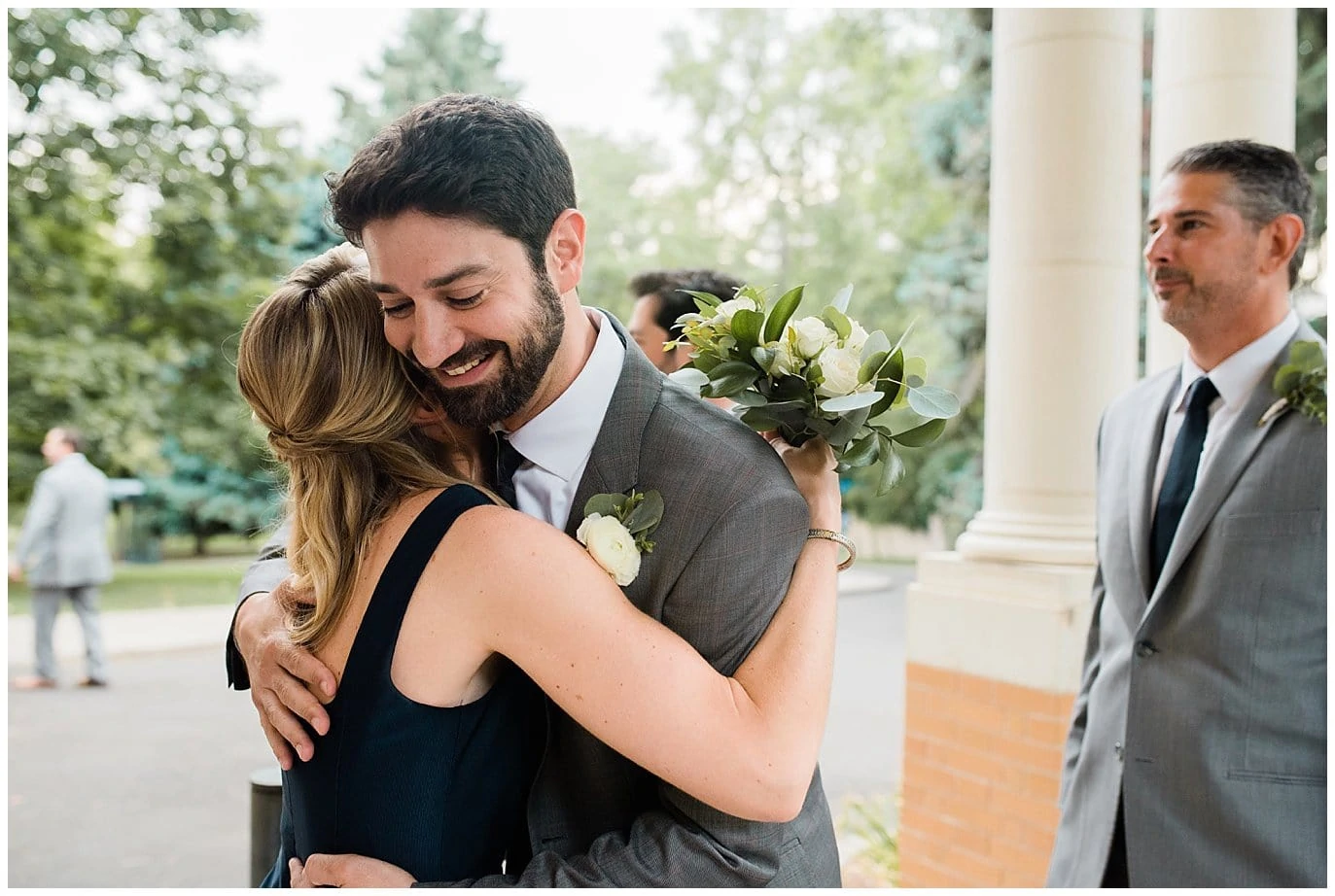 emotional hug denver wedding photo