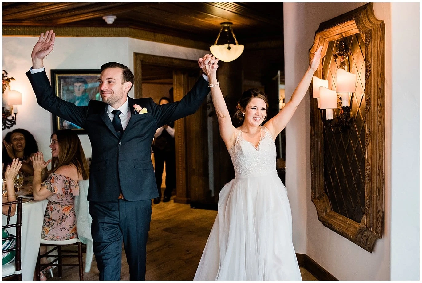 bride and groom grand entrance at Sonnenalp Hotel Vail Colorado Wedding by Denver Wedding Photographer Jennie Crate